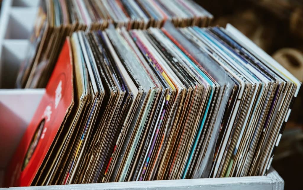 close up of vinyl records separated in crates